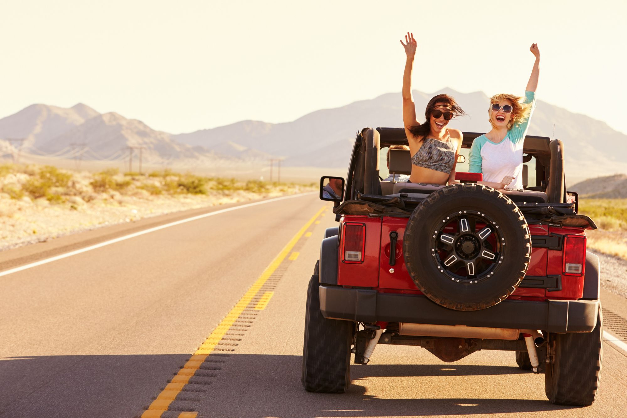 two people in back of jeep