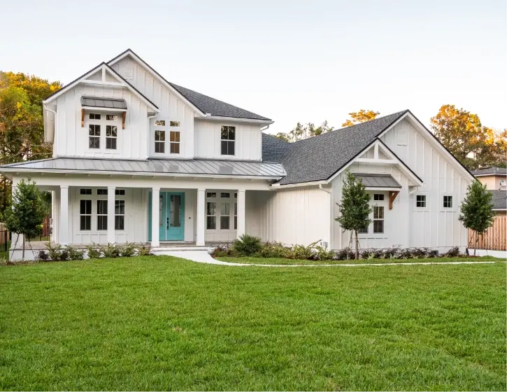 white house with teal front door