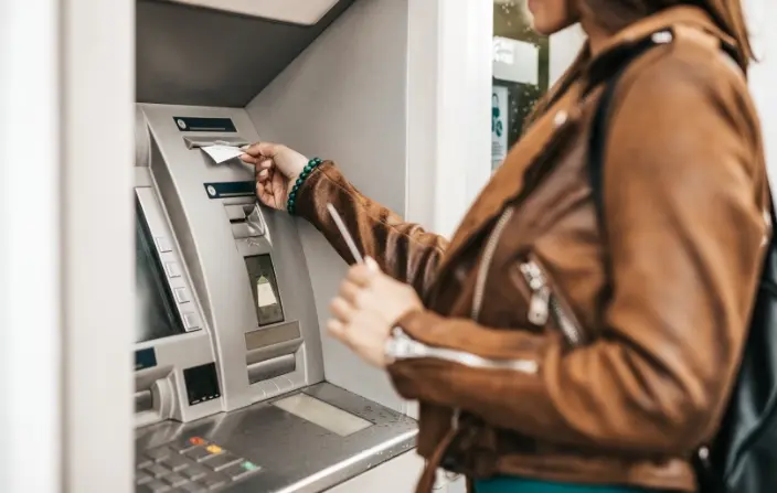 woman using atm